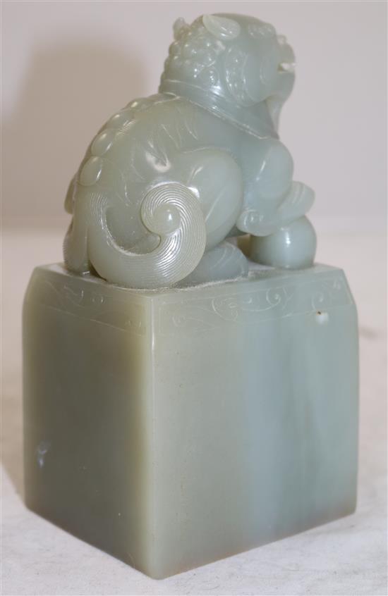 A large Chinese celadon jade lion-dog seal, height 15.5cm